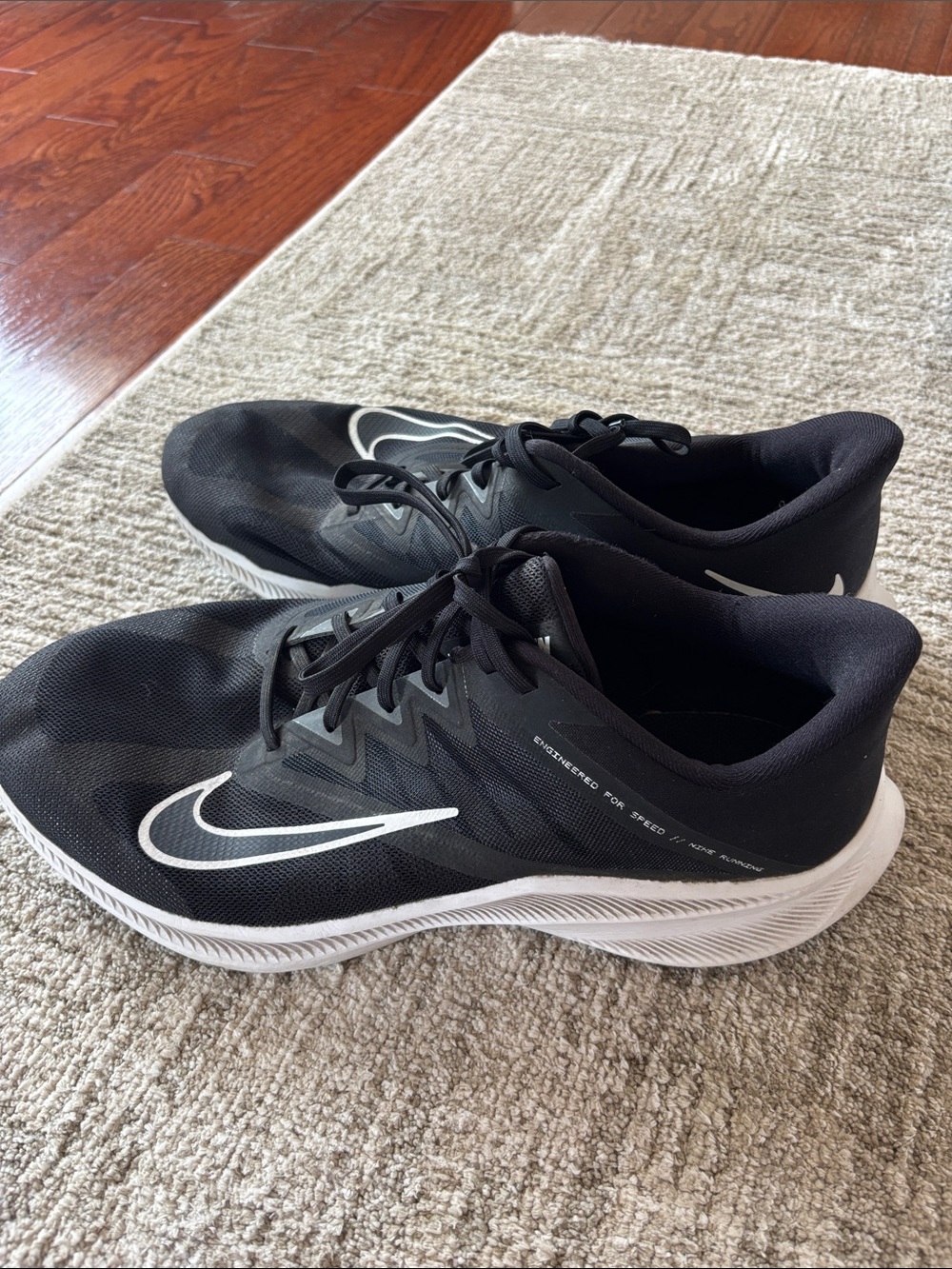 Nike Men’s Black Athletic Shoes with White Swoosh